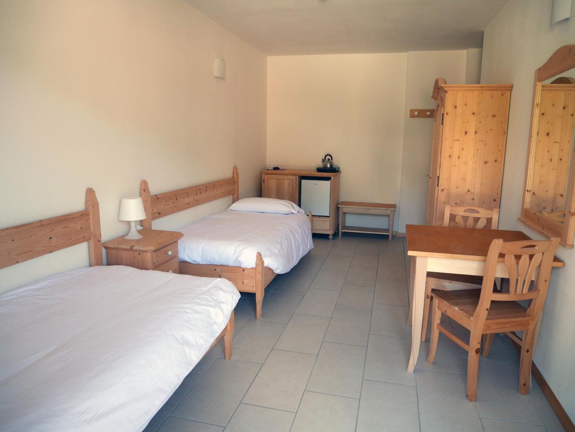 Hotel Elbele Garni Folgaria Pokoj fotografie